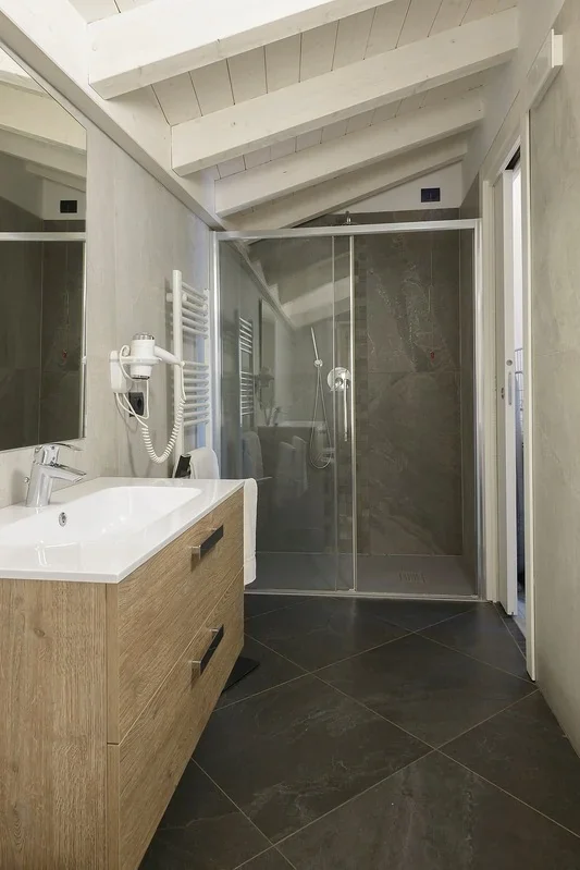Camelia bathroom with a walk-in shower