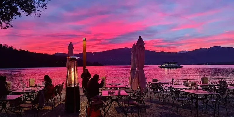 Kopi Club terrace beside Lake Maggiore at sunset