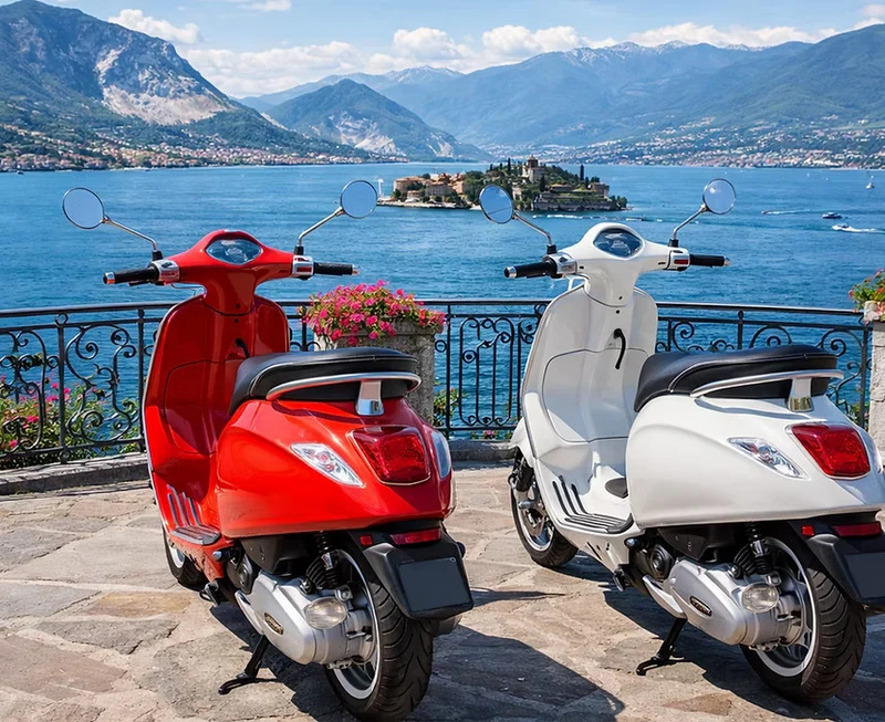 Vespa scooters parked beside Lake Maggiore